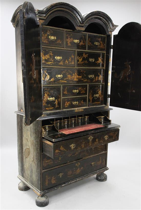 A William & Mary chinoiserie black japanned double dome top secretaire cabinet, W.3ft 6in. D.1ft 9in. H.6ft 5in.